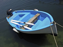 Blue Rowboat In The Sea