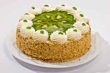 Wall Mural - Bisquit cake with  kiwi fruit on the plate