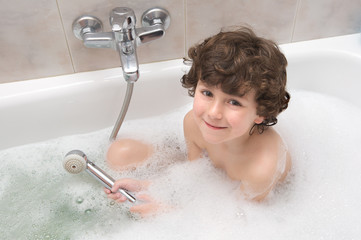 Sticker - Small child happy and smiling in the bath