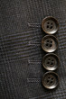 Buttons on a sleeve of a man's suit