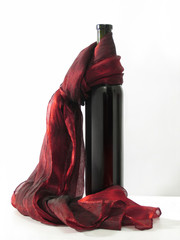 Wine bottle and  red scarf