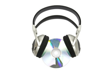 Grey and black earphones and compact disc