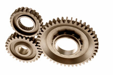 Three Gears Meshing Together Over White