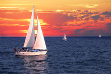 Sailboats At Sunset