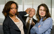 © Scott Griessel - Businesswomen Push back a Businessman