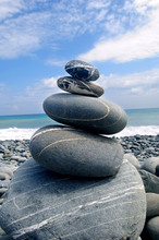Zen Stack Of Pebbles On The Beach