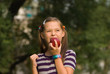 © Andriy Petrenko - girl with an apple in a hand