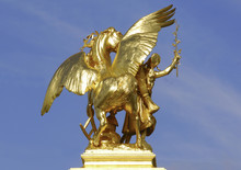 France; Paris; Bronze And Golden Leaf Statue