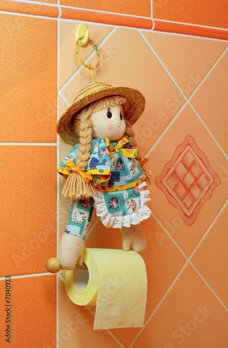 toilet paper doll holder