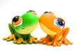 Two frog toys isolated on white