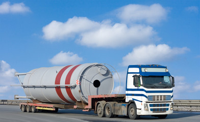 Wall Mural - truck moves huge industrial construction