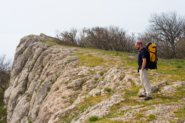 Active people - Person climbing a cliff