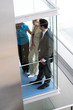 © Doreen Salcher - business team is talking in a elevator