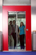 © Doreen Salcher - business team is talking in a elevator