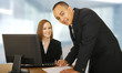 © visi.stock - Two Business People In Office