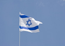 Israeli Flag On Blue Sky