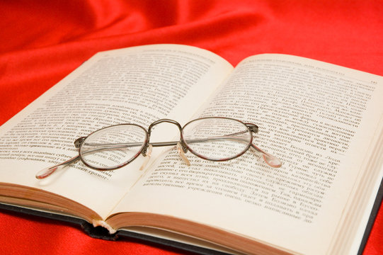 glasses and book
