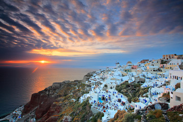 Wall Mural - Sunset at Oia village on Santorini island, Greece