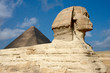 Great Sphinx on the background of pyramid in Egypt