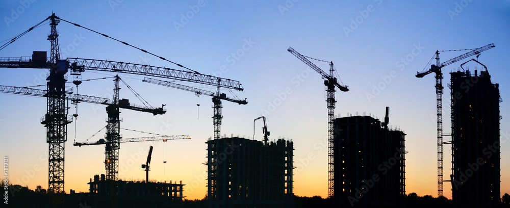 construction cranes silhouette sunset - obrazy, fototapety, plakaty 