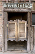 Old Western Swinging Saloon Doors With Sign