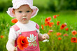 canvas print picture - Baby-girl with red flower