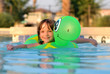 © BCFC - Cute little girl playing in swimming pool