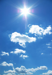 sun and clouds in a sky
