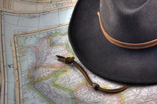 Felt Hat Over Vintage, Warn Out Map Of South America