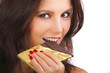 Beautiful girl eating chocolate,close-up