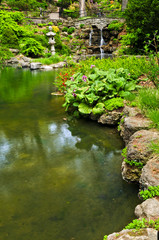 Wall Mural - Cascading waterfall and pond