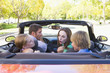 © Monkey Business - Family in convertible car arguing
