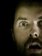© dundanim - Closeup on amazed scared male face