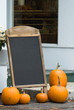 Blank halloween billboard adorned with pumpkins