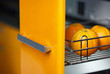 Tasty orange in kitchen in fridge