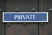 Private Sign On An Old Wooden Door