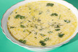 Cheese soup in a white soup-plate