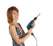 © SASHA - The young girl with a building drill on a white background.