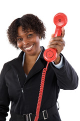 Canvas Print - Woman with a red phone a over white background