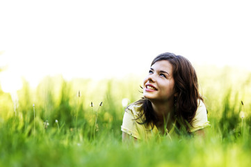 pretty smiling girl relaxing outdoor