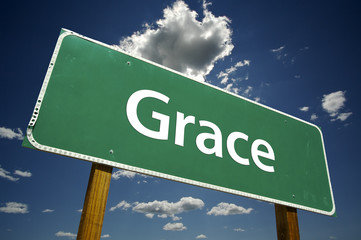 Grace Road Sign with dramatic clouds and sky.