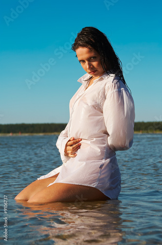 Wet Men S Shirt Outlines The Naked Body Of Young Girl Stock Photo Adobe Stock