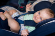© Renata Osinska - little baby sitting in safety car seat