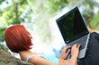 © Foxy_A - cute young girl with laptop outdoors