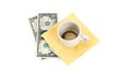Empty cup of coffee with 2 dollars tip