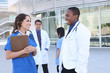 © Stephen Coburn - A successful medical team outside hospital building