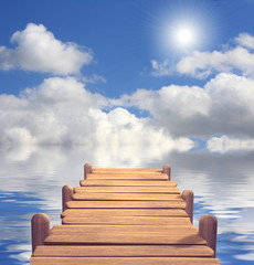 Canvas Print - the wooden mooring covered by the sun