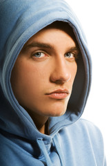 Wall Mural - Handsome young man in a hood