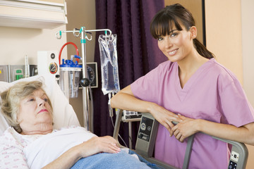 Wall Mural - Nurse Checking Up On Patient