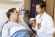 © Monkey Business - Doctor And Patient Talking To Each Other